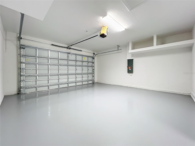 10006 Degas Ter, Bradenton, FL 34212 - garage featuring electric panel and a garage door opener