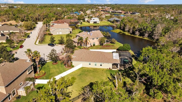 aerial view with a residential view and a water view