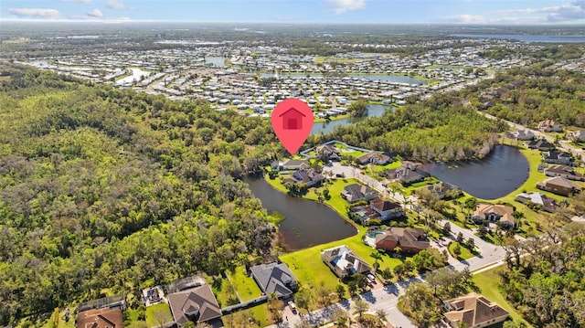 aerial view with a residential view and a water view