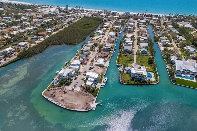 bird's eye view with a residential view and a water view