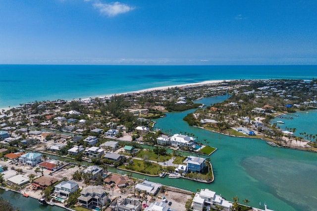 bird's eye view with a residential view and a water view