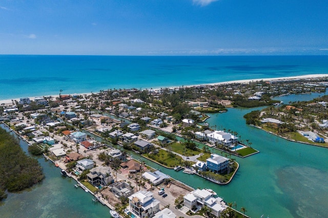 bird's eye view with a residential view and a water view