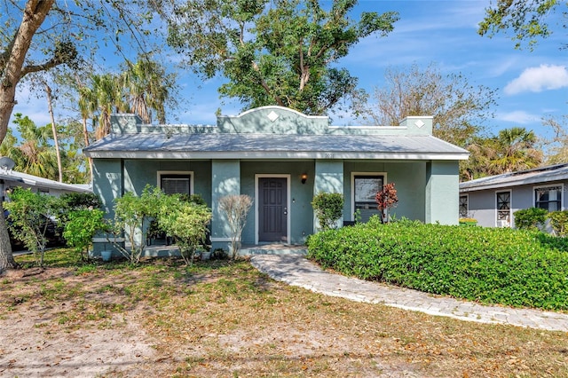 view of front of property featuring stucco siding