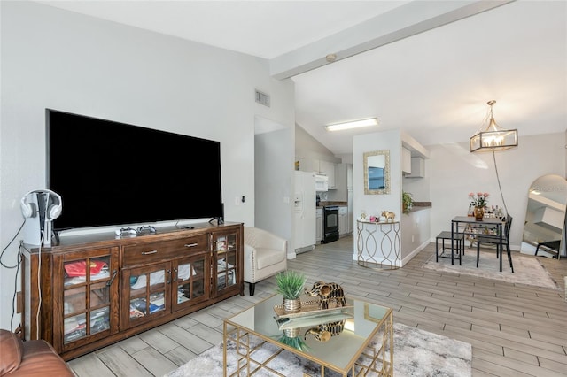 living room featuring visible vents, lofted ceiling with beams, an inviting chandelier, and wood tiled floor