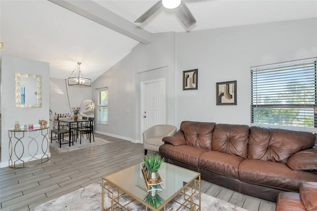 living room with ceiling fan with notable chandelier, vaulted ceiling with beams, baseboards, and wood tiled floor