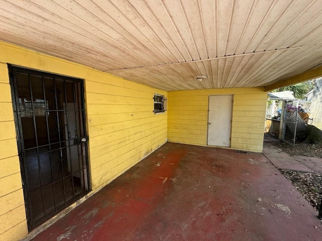 view of patio / terrace with a carport