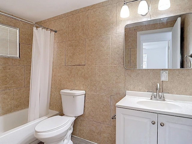 3512 N 10th St, Tampa, FL 33605 - full bath with tile walls, vanity, shower / bath combination with curtain, and toilet