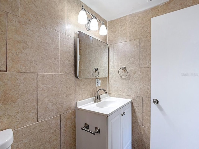 3512 N 10th St, Tampa, FL 33605 - half bath with tile walls, toilet, and vanity