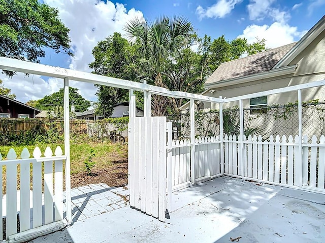 3512 N 10th St, Tampa, FL 33605 - view of gate with a patio area and fence