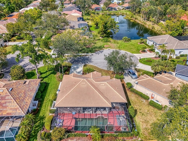 aerial view with a residential view and a water view