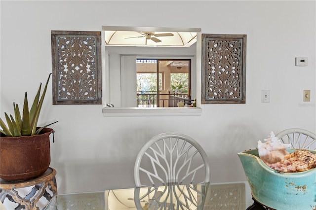 dining room featuring ceiling fan