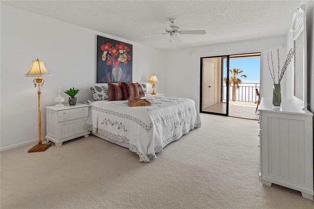 bedroom with access to exterior, a textured ceiling, light carpet, and ceiling fan