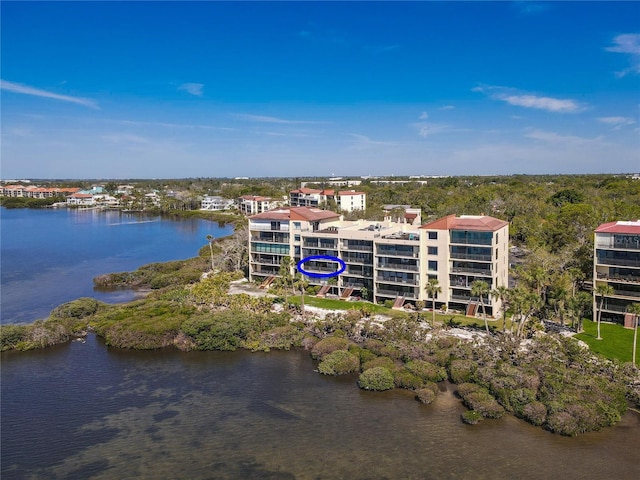 drone / aerial view featuring a water view