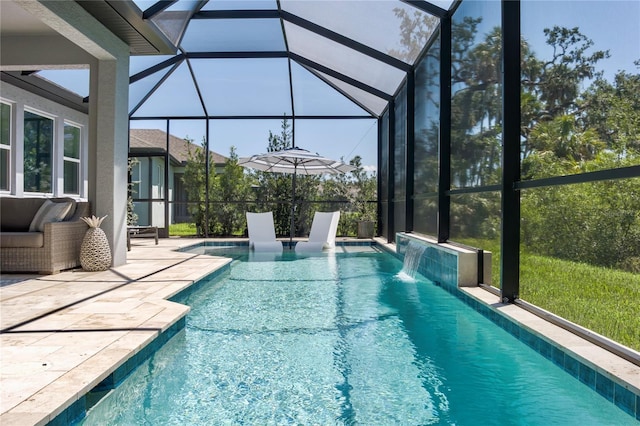 5621 Badini Way, Palmetto, FL 34221 - swimming pool with a patio area and glass enclosure