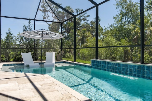 5621 Badini Way, Palmetto, FL 34221 - outdoor pool with glass enclosure and a patio