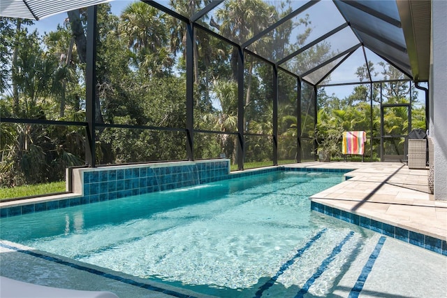 5621 Badini Way, Palmetto, FL 34221 - swimming pool with a patio and glass enclosure