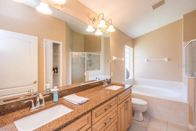 full bath featuring tile patterned flooring, a stall shower, visible vents, and a sink