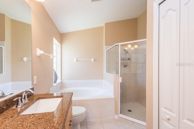 bathroom with toilet, tile patterned floors, a bath, and a stall shower