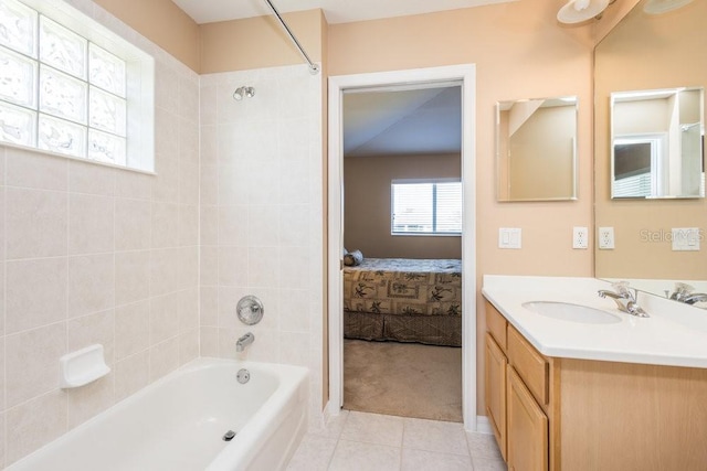 full bathroom featuring tile patterned floors, shower / bath combination, ensuite bath, and vanity