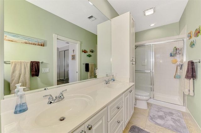 full bath featuring double vanity, visible vents, a shower stall, and a sink