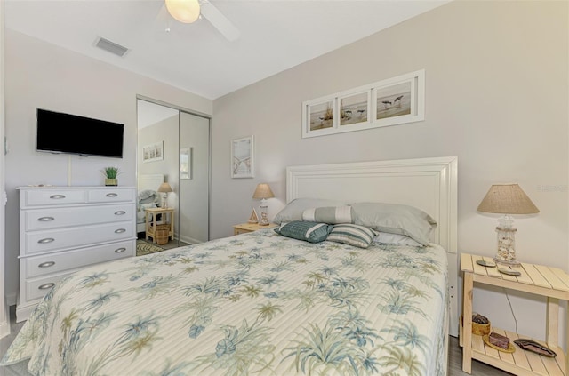 bedroom featuring visible vents, a closet, and a ceiling fan