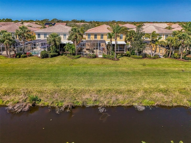 bird's eye view featuring a residential view and a water view