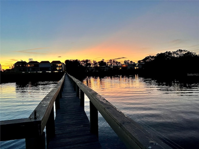 dock area featuring a water view