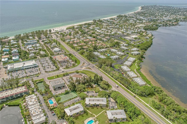 drone / aerial view with a residential view and a water view