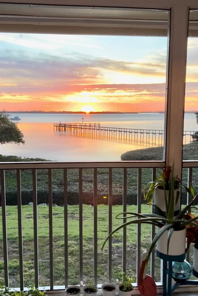 balcony at dusk with a water view