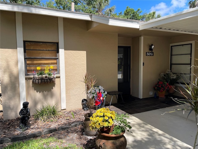 5013 Village Gardens Dr Unit 34, Sarasota, FL 34234 - entrance to property with stucco siding