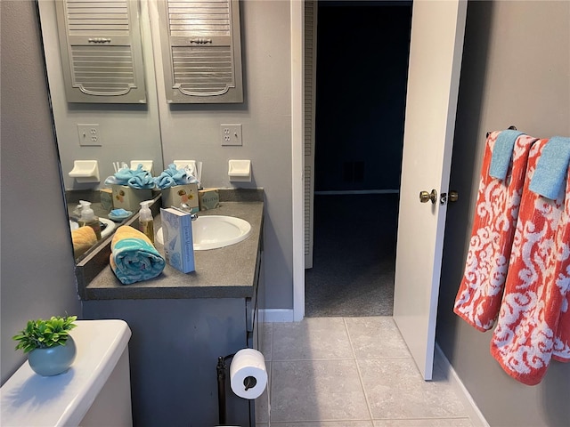 5013 Village Gardens Dr Unit 34, Sarasota, FL 34234 - bathroom with tile patterned flooring and vanity