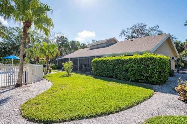 5013 Village Gardens Dr Unit 34, Sarasota, FL 34234 - view of yard featuring a gate