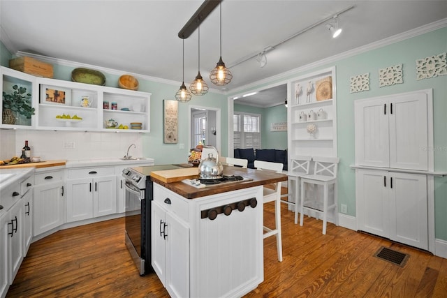 kitchen featuring open shelves, visible vents, dark wood-type flooring, and electric range oven