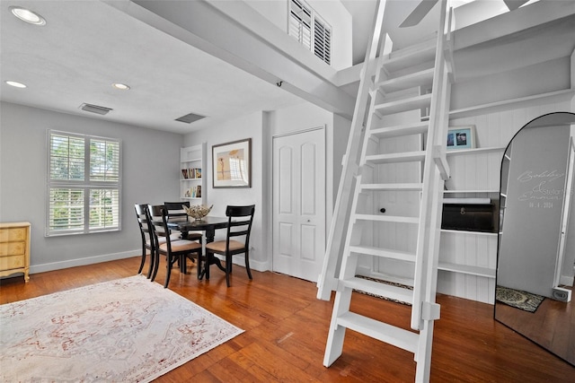 dining room featuring recessed lighting, wood finished floors, visible vents, and baseboards