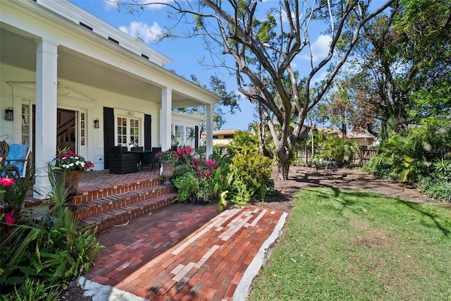 view of yard featuring a porch