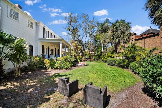 view of yard with a porch