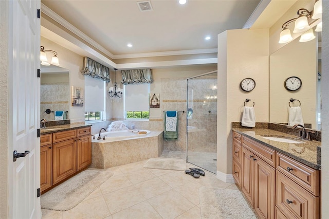 full bath with crown molding, a sink, a shower stall, a bath, and visible vents