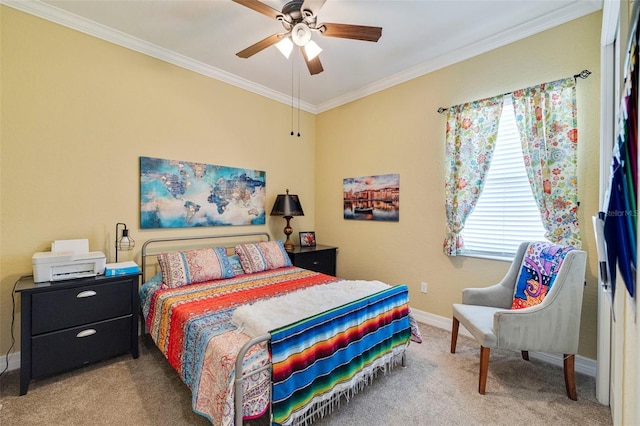 bedroom featuring carpet flooring, ornamental molding, and baseboards