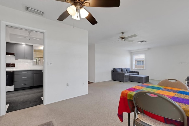 3140 Village Green Dr Unit 1119, Sarasota, FL 34239 - interior space with carpet flooring, visible vents, and a ceiling fan