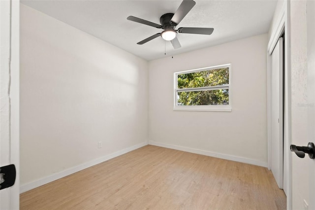 6639 16th St N, Saint Petersburg, FL 33702 - unfurnished bedroom featuring a closet, light wood-style flooring, a ceiling fan, and baseboards