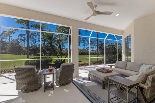9408 Glen Abbey Ln, Sarasota, FL 34238 - sunroom / solarium featuring outdoor lounge area, ceiling fan, and view of scattered trees