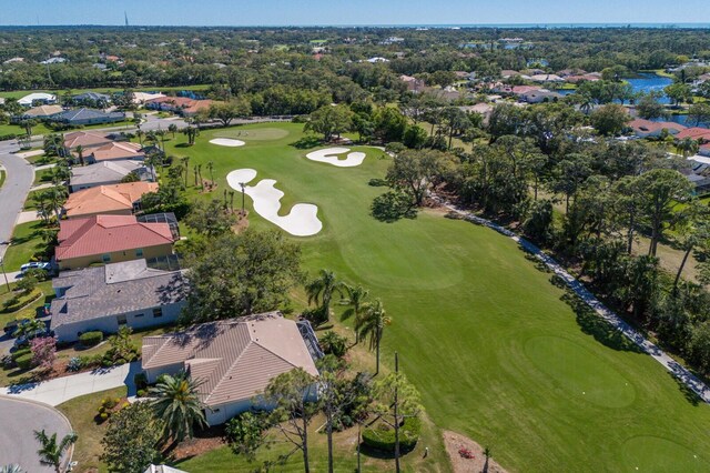 9408 Glen Abbey Ln, Sarasota, FL 34238 - aerial overview of property's location featuring a golf club, a tree filled landscape, and nearby suburban area