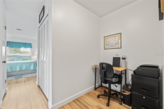 3611 22nd Ave W, Bradenton, FL 34205 - office area featuring light wood-type flooring and baseboards