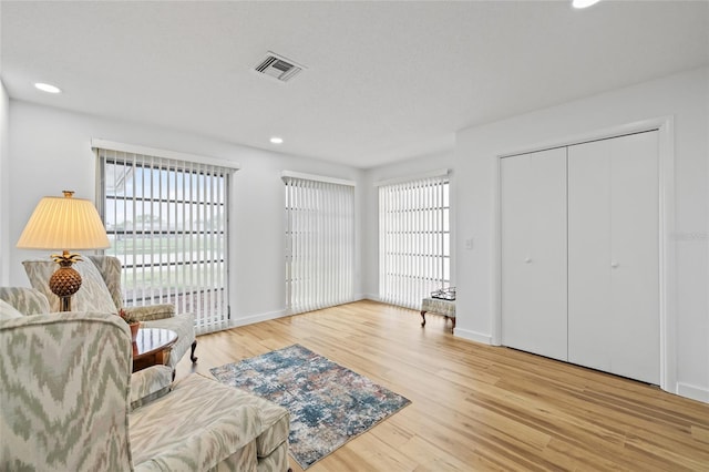 3611 22nd Ave W, Bradenton, FL 34205 - sitting room with healthy amount of natural light, wood finished floors, and recessed lighting