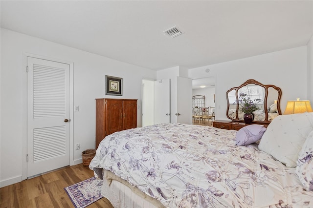 3611 22nd Ave W, Bradenton, FL 34205 - bedroom with wood finished floors and baseboards