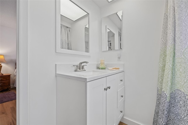 3611 22nd Ave W, Bradenton, FL 34205 - bathroom featuring vanity and wood finished floors