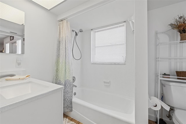 3611 22nd Ave W, Bradenton, FL 34205 - full bath featuring vanity, shower / bath combination with curtain, and wood finished floors