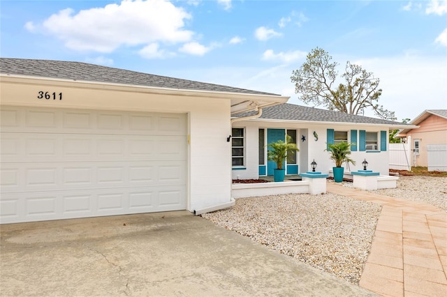 3611 22nd Ave W, Bradenton, FL 34205 - single story home featuring driveway, a garage, roof with shingles, and covered porch