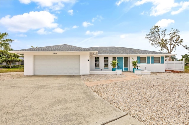 3611 22nd Ave W, Bradenton, FL 34205 - ranch-style home with driveway, a garage, and stucco siding