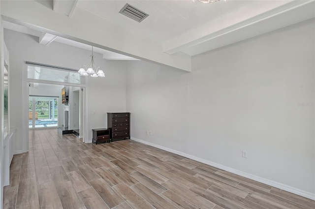 interior space featuring visible vents, baseboards, wood tiled floor, a chandelier, and beamed ceiling